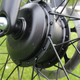 A photo of the motor in the front of the VanMoof S3 electric bike.
